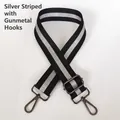 Close-up of adjustable black and silver striped bag strap with gunmetal swivel hooks - Striped Silver & Gunmetal Hook