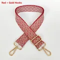 Close-up of red and beige geometric diamond pattern on thick canvas bag strap with gold buckle - Red + Gold Hook