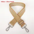 Close-up of yellow jacquard canvas strap with diamond pattern and silver metal hooks - Yellow + Silver Hook