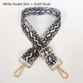 Detail of adjustable white snakeskin shoulder strap with elegant gold metal hooks - White Snakeskin + Gold Hook