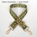 Detail of adjustable yellow snake pattern bag strap with gold metal swivel hooks - Yellow Snakeskin + Gold Hook