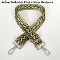 Detail of adjustable bag strap with yellow snake pattern and silver metal swivel hooks - Yellow Snakeskin + Silver Hook