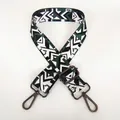Detail of wide adjustable crossbody bag strap with green geometric camo and gunmetal hooks - Pattern B58 With Gunmetal Hook