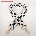 Detail of Style B59 adjustable bag strap with black and white geometric pattern and gold hooks - Pattern B59 With Gold Hook