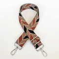 Detail of wide adjustable canvas bag strap with black and khaki geometric chevron pattern - Black Brown + Silver Hooks