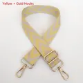 Detail of adjustable wide woven shoulder strap with yellow chevron pattern and silver hooks - Yellow + Silver Hook