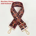 Detail of bohemian geometric pattern on adjustable wide bag strap with gold metal hooks - Blue Base Orange + Gold Hook