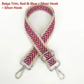 Close-up of beige woven bag strap with red and blue zigzag pattern and silver metal hooks - Beige Edge Red Blue + Silver Hook