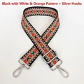 Macro shot of thick canvas shoulder strap with orange diamond pattern and silver hook - Black Base White Orange + Silver Hook