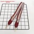 Detail of adjustable burgundy striped PU leather bag strap with gold metal hooks - Wine Red with Wine Red Leather and Gold Hook