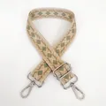 Detail of beige and matcha green jacquard canvas strap with silver metal lobster clasps - Beige Base Matcha Green + Silver Hook