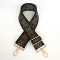 Detailed close-up of retro woven shoulder strap with green geometric patterns and gold clips - Style B100 (Gold Hook)