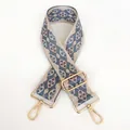 Detail of blue geometric embroidered bag strap with gold rotating metal hooks - Style B106 (Gold Hook)