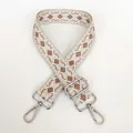 Close-up of beige canvas bag strap with khaki diamond jacquard and silver metal hooks - Beige Base White Khaki + Silver Hook