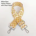 Close-up of yellow and white geometric nylon bag strap with silver metal hooks - White Base Yellow + Silver Hook