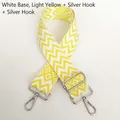 Macro detail of patterned woven bag strap with silver metal swivel hooks and adjuster - White Base Light Yellow + Silver Hook