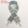 Detail of white and green geometric nylon strap with silver metal hooks and buckle - White Base Green + Silver Hook