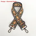 Close-up of ethnic orange woven bag strap with geometric patterns and gunmetal hardware - Orange-Gunmetal Hook