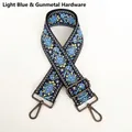 Detail of light blue ethnic embroidered bag strap with floral patterns and gold hooks - Light Blue-Gunmetal Hook