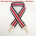 Detail of adjustable black, white, and red striped nylon shoulder strap with gold metal hooks - Black Edge White/Red Stripe + Gold Hook