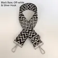 Dettaglio della tracolla larga in nylon con motivo geometrico e ganci in metallo - Base Nera Crema + Gancio Argento