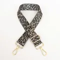 Detail of adjustable leopard print bag strap with gold metal buckles and grey pattern - Grey + Gold Hook