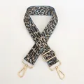 Close-up of adjustable leopard print bag strap in light blue with gold metal hooks - Light Blue + Gold Hook