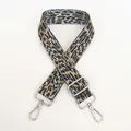 Detail of light blue leopard woven bag strap with silver metal swivel hooks and buckle - Light Blue + Silver Hook