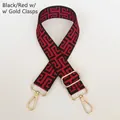 Detail showing the red and black meander pattern woven bag strap with gold lobster clasps - Silver Hook / Black Base Red