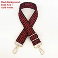 Detail of adjustable geometric jacquard bag strap with gold metal lobster clasps - Silver Hook / Black Base Brick Red