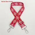 Close-up of red and white diamond pattern wide nylon bag strap with silver metal hooks - Red + Silver Hook