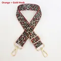Detail of adjustable leopard print bag strap in orange and gold with metal swivel hooks - Orange + Gold Hook