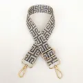 Detail of adjustable off-white and grey geometric canvas bag strap with gold metal hooks - Silver Hook / Beige Base Grey