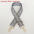 Detail of adjustable bag strap featuring grey and white Greek key pattern with gold hooks - Silver Hook / Grey Base White
