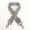 Detail of adjustable leopard print bag strap in grey and white with gunmetal swivel hooks - Grey White + Gunmetal Hook