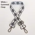 Detail of adjustable wide nylon bag strap with black geometric pattern and gunmetal hooks - White + Gunmetal Hook