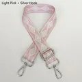 Detail of adjustable wide bag strap in light pink with geometric weave and silver hooks - Light Pink + Silver Hook