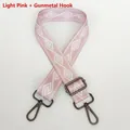 Detail of light pink wide nylon bag strap with white geometric pattern and gunmetal hooks - Light Pink + Gunmetal Hook