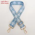 Detail of light blue wide woven strap with white diamond pattern and gold metal hooks - Light Blue + Gold Hook