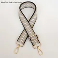 Detail of khaki canvas bag strap with white dots, black edges and gold metal hooks - Black Edge Khaki + Gold Hook