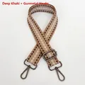 Detail of adjustable khaki checkered woven bag strap with gunmetal swivel snap hooks - Dark Khaki + Gunmetal Hook