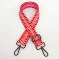 Close-up of pink geometric plaid bag strap with durable gunmetal swivel snap hooks - Pink + Gunmetal Hook