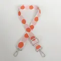 Close-up of adjustable 2.5cm polka dot bag strap with silver metal swivel hooks - White-Pink + Silver Hook