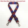 Detail of adjustable woven bag strap featuring blue and red polka dots with gunmetal hooks - Black/Blue/Brick Red + Gunmetal Hook