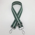 Detail of adjustable nylon bag strap with arrow pattern and silver swivel hooks - Green + Silver Hook