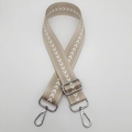 Detail of adjustable khaki nylon bag strap with white chevron embroidery and metal hooks - Khaki + Silver Hook