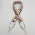 Detail view of colorful geometric woven bag strap with white leather and gold hooks - Silver Hook / Bright Yellow Red / White Leather