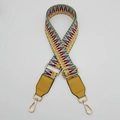 Detail of adjustable woven handbag strap with colorful geometric patterns and gold metal buckles - Silver Hook / Yellow Light Blue / Yellow Leather