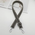Detail of herringbone woven canvas bag strap with polished silver metal hook and adjuster - Black And Beige With Silver Hook