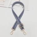 Detailed view of navy and white striped canvas strap with gold adjustable metal buckles - Blue And White With Gold Hook